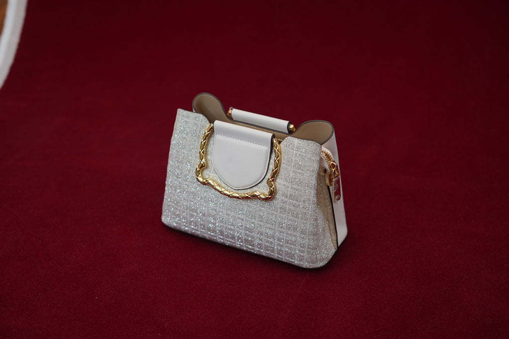Maya Ivory Slingbag