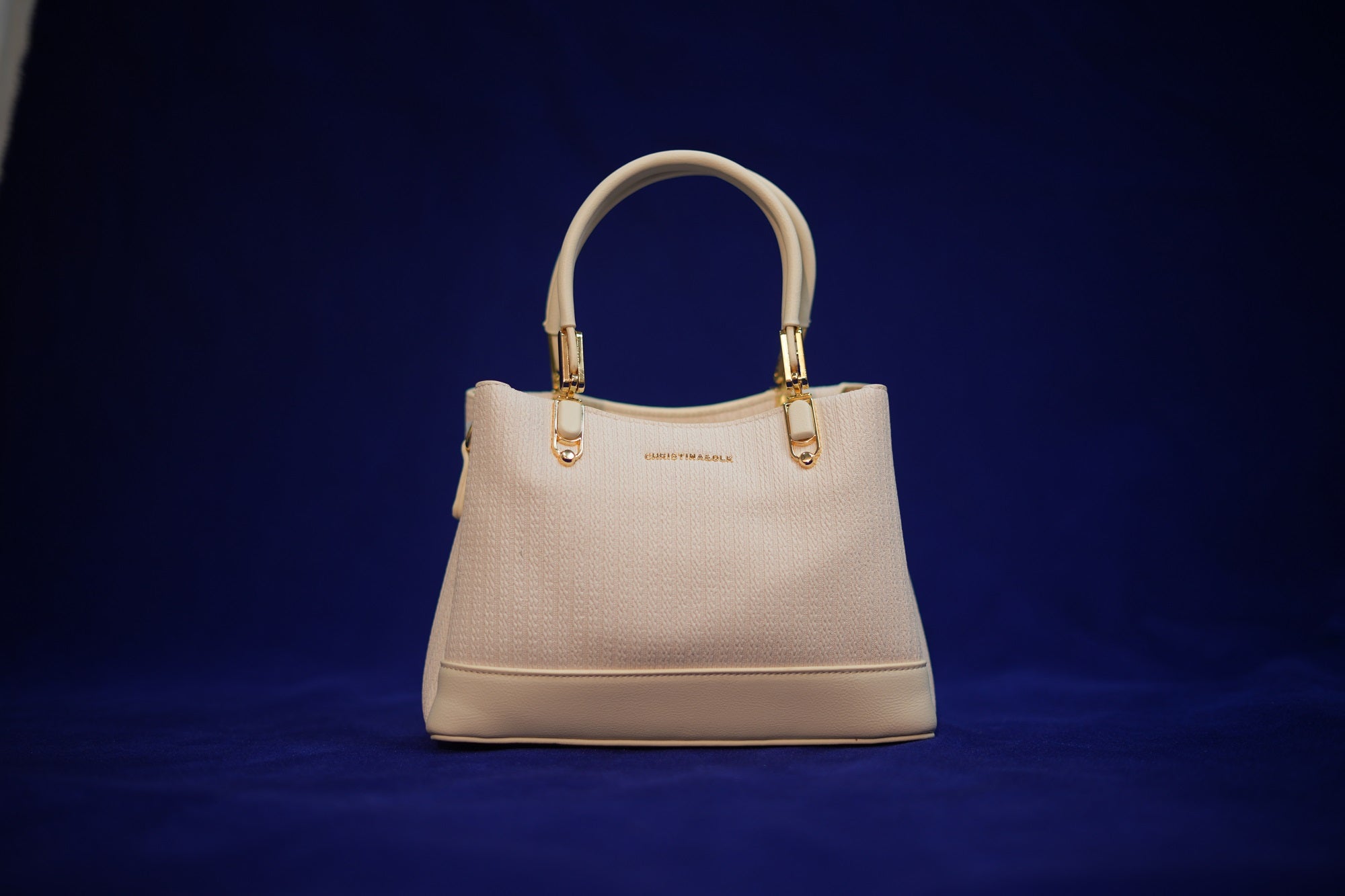 Maya Ivory Padded Handbag