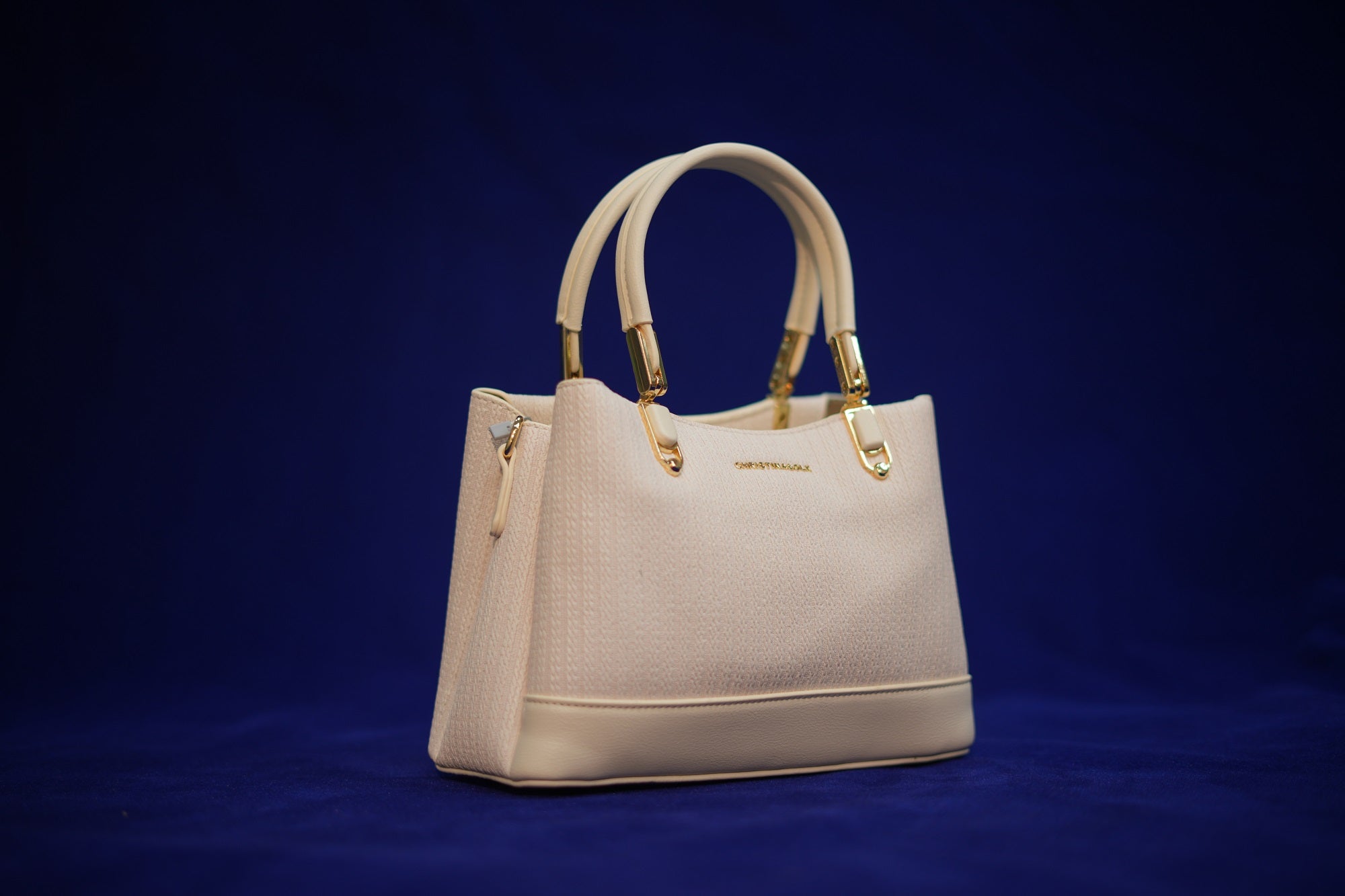 Maya Ivory Padded Handbag