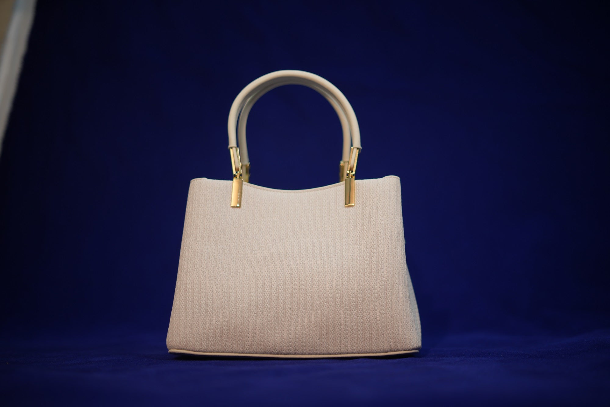 Maya Ivory Padded Handbag