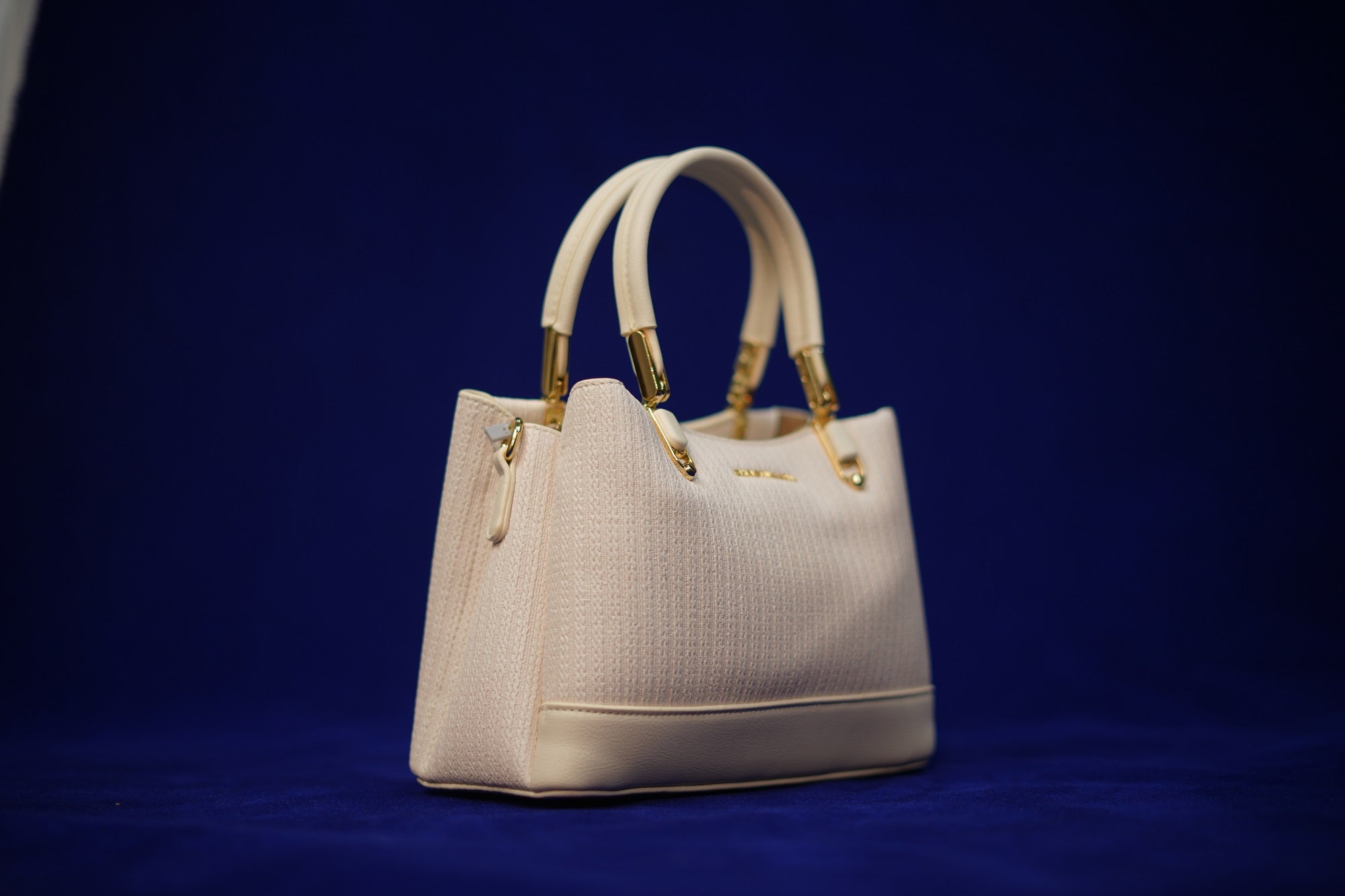 Maya Ivory Padded Handbag