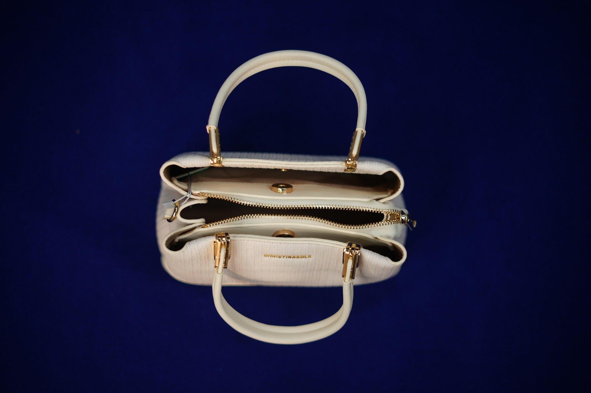 Maya Ivory Padded Handbag