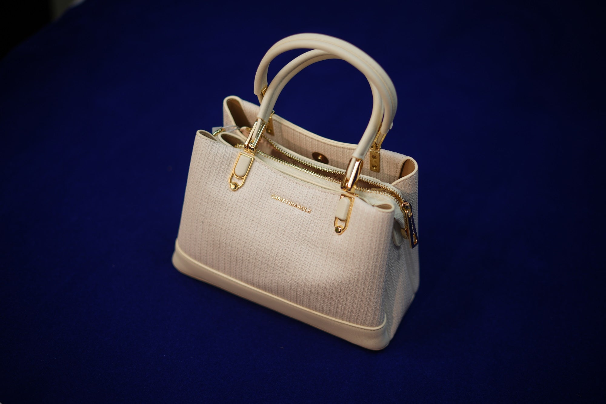 Maya Ivory Padded Handbag