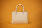 Maya Ivory Tassel Handbag