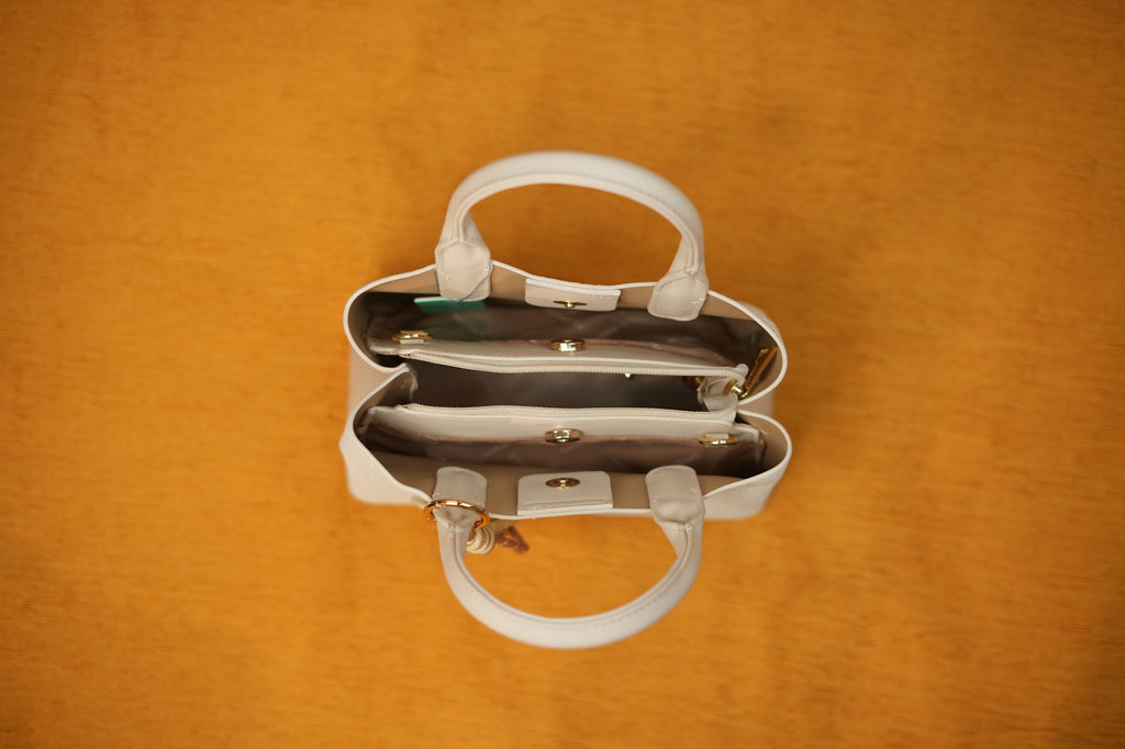 Maya Ivory Tassel Handbag