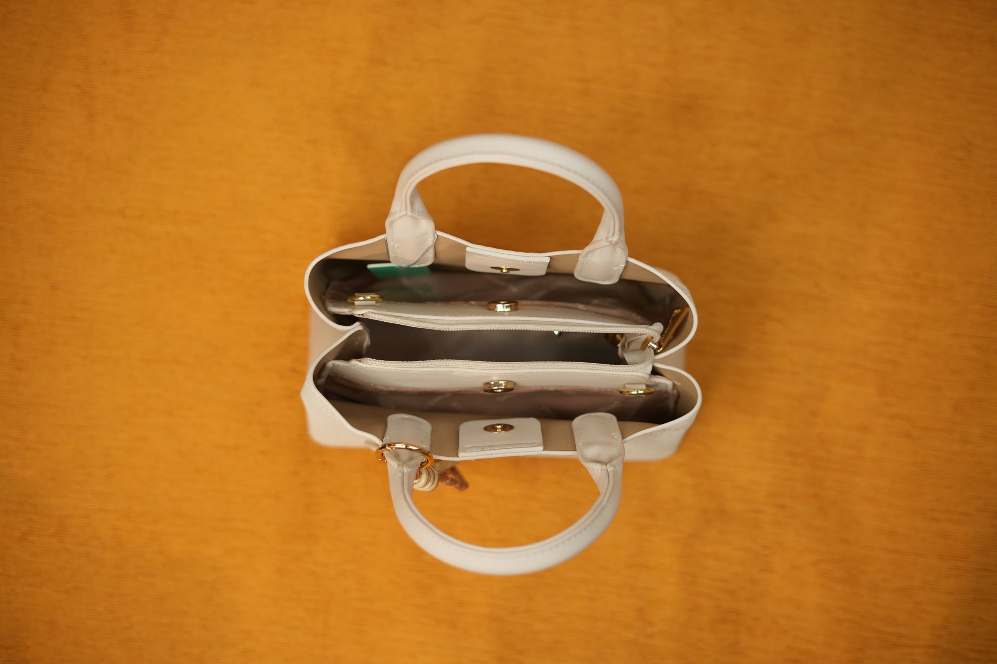 Maya Ivory Tassel Handbag