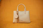 Maya Ivory Tassel Handbag