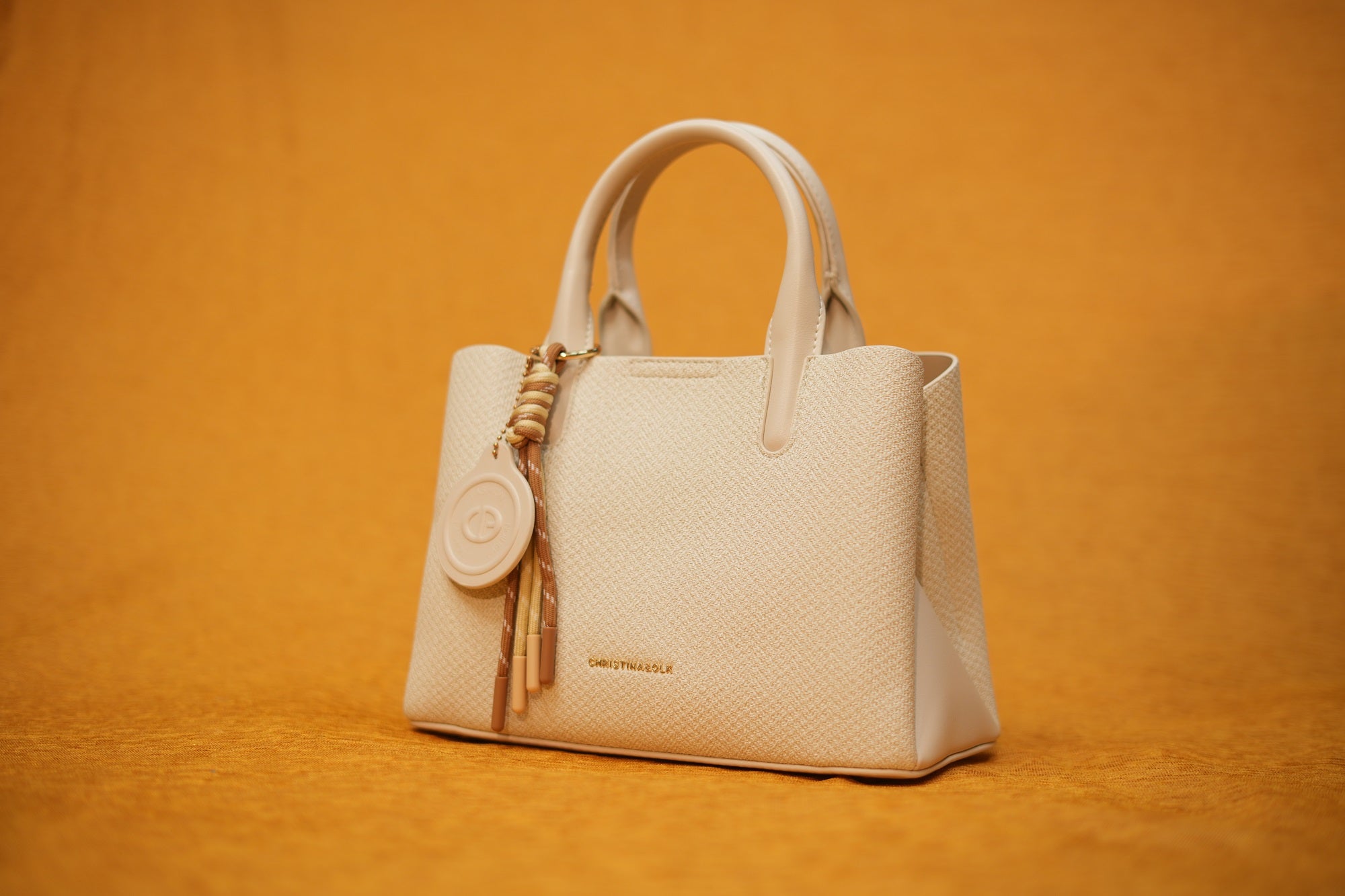 Maya Ivory Tassel Handbag