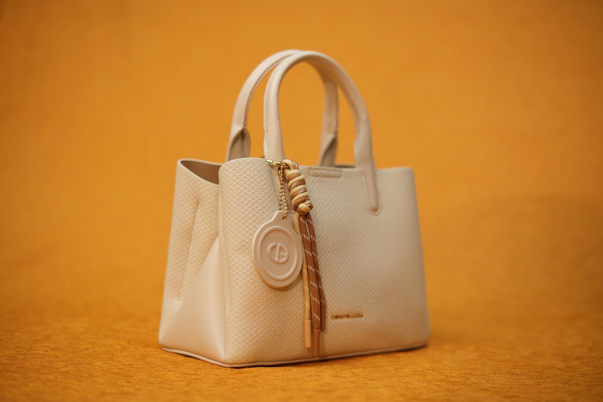 Maya Ivory Tassel Handbag