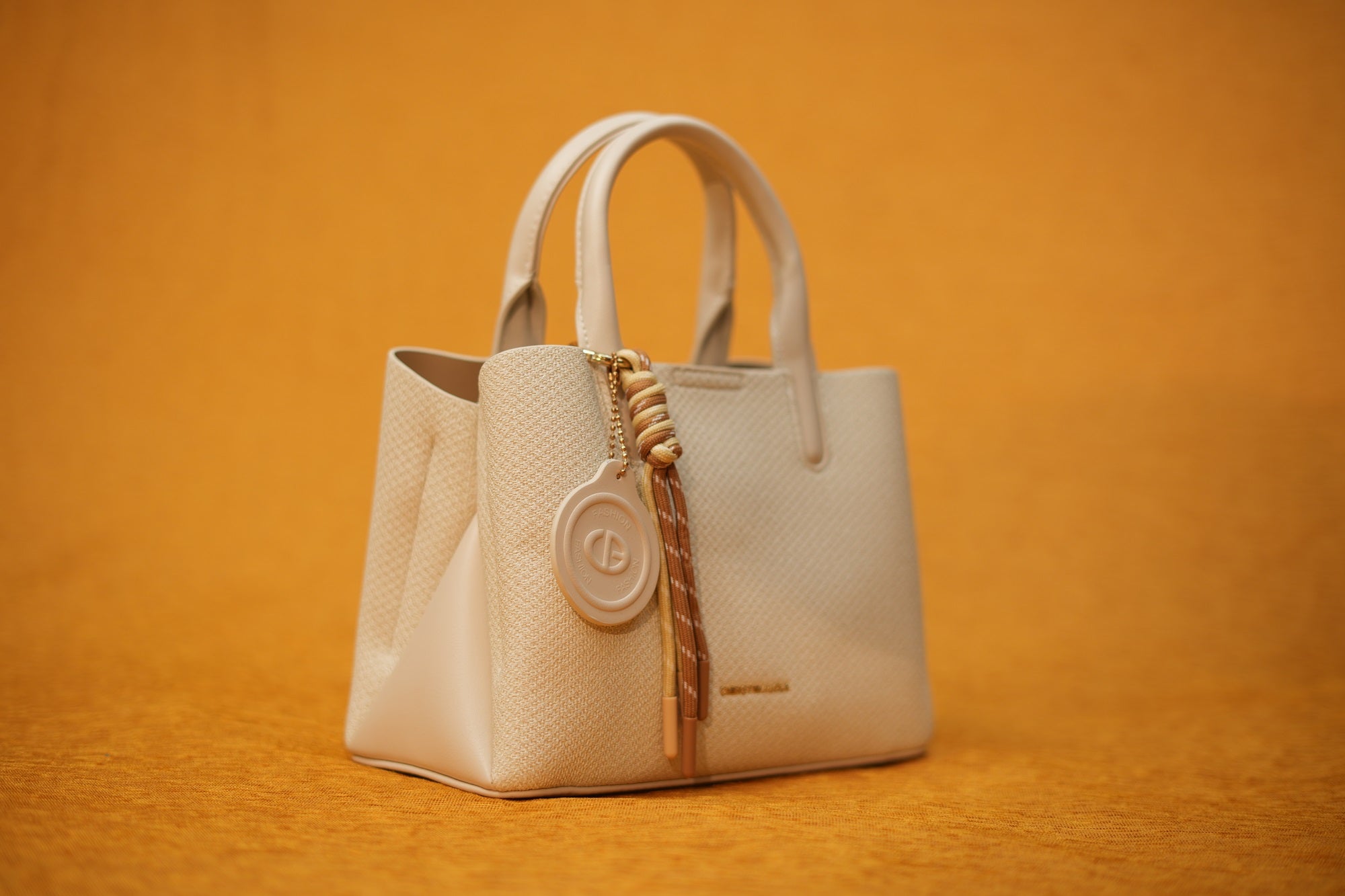 Maya Ivory Tassel Handbag