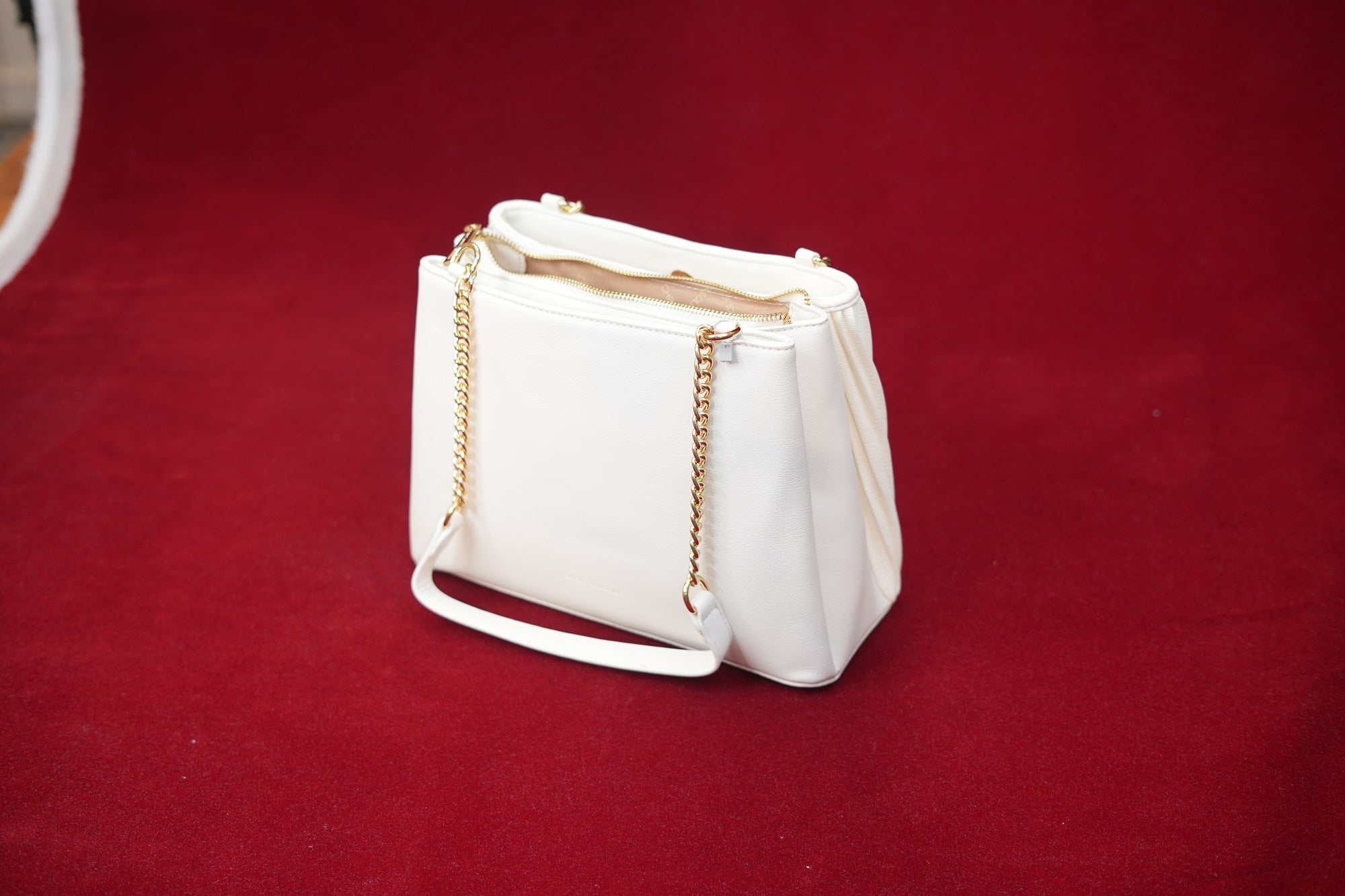 Maya Ivory Slingbag