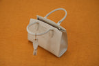 Maya Ivory Elan Handbag